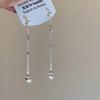Pendientes de Borla Larga Chinos Nuevos "Agitar en un Paso" Femeninos. Diseño nicho arete clip de oreja de alto sentido al por mayor