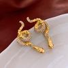 Pendientes de perlas de serpiente con circonitas de celebridades de Internet, pendientes vintage de nicho que combinan con todo, pendientes ligeros de lujo de alta gama, venta al por mayor para mujeres