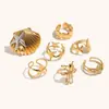 Joia Criativa Estilo Férias Oceânicas Transfronteiriças Europeia e Americana Anel Casual de Aço Inoxidável Banhado a Ouro 18K Estrela do Mar Concha para Mulheres