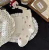 Calcetines de otoño estilo coreano para mujer, calcetines nuevos de dibujos animados de cordero, bloques de color, de media pantorrilla, algodón, lindos, estilo preppy, sin costuras y con diseño de volantes