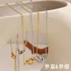 Moda Europeia e Americana Elegante Estiloso Acessível Luxo Versátil Colar Aço Inoxidável Banhado Ouro 18K Pingente Amarrado Colar Feminino Nicho