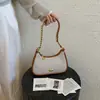Moda Retro Bolso de un Hombro para Mujer 2026 Verano Nuevo Bolso de Axila de Alta Gama Simple Versátil para Viaje Bolso Cruzado