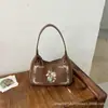 Bolsa de Mão Artística Feminina Bordada com Trevo de Quatro Folhas e Nota Musical Retrô Outono 2026 Bolsa Tote Fresca de Ombro Moda para o Dia a Dia