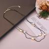 Joyería transfronteriza europea y americana, elegante colgante de perlas de imitación de forma especial, collar de cuentas multicapa sencillo y combinable.