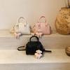 Bolsa de mão portátil simples de moda com textura estilo coreano primavera casual 2025 casual estilo ocidental design de nicho bolsa travesseiro