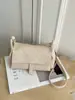 Bolsas de Design de Nicho para Mulheres Verão 2026 Novas Populares Versáteis Bolsas Transversais Qualidade Ombro Único Sob o Braço Bolsas Saco