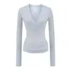 Camiseta Slim Estilo Sexy Americano para Mulheres Outono 2025 Nova Chic Decote em V Camisa de Camada Interna Manga Longa