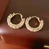 Aretes redondos geométricos de espiga de trigo incrustados con circonita, exquisitos y únicos, aretes de nicho con un sentido de lujo y sofisticación, al por mayor