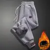 Calças Casuais Outono e Inverno Masculinas para Exterior Quentes com Plus Velvet Calças de Moletom Estilo Coreano Tendência Soltas Calças Jogger Calças Harem