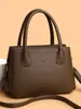 Bolso de mano vintage de cuero suave transfronterizo para mujer, nuevo modelo 2026, bolso de hombro y cruzado de moda de alta gama de gran capacidad