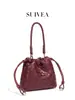 Bolso de mujer tejido de comercio exterior nuevo, bolso de hombro y bandolera para el trabajo, bolso de alta gama tipo 'bolsa de dumpling', bolso de mano tipo bolsa de la suerte con cordón