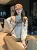 Primavera 2026 Nuevo Estilo Bloque de Color Lana Jacquard Fair Isle Cuello Redondo Holgado Suéter Estilo Coreano Engrosado para Mujer en Color Avena