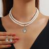 Collar Versátil de Perlas y Gemas para Viajeros Europeos y Americanos para Mujer Gotas de Agua Aretes Chapados en Plata Juego de Joyería de Aretes Explosiones de Amazon
