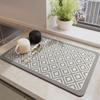 Alfombrilla de drenaje para fregadero de cocina al por mayor transfronteriza, alfombrilla absorbente de agua y aceite para mesa de comedor, alfombrilla antideslizante de tierra de diatomeas, alfombrilla de aislamiento térmico para encimera de cafetera