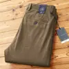 Pantalones largos de pana gruesa para otoño e invierno 2023, de alta gama, cómodos, versátiles, para hombre, de negocios, sin planchado, rectos, casual