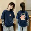 Nueva camiseta de estilo coreano para niñas, imitación de dos piezas, manga larga, camiseta básica de algodón puro para otoño, top versátil y elegante a la moda para niñas