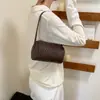 Bolso Cilindro Tejido de Moda Retro para Mujer 2026 Nuevo Bolso de Mano de Moda Bolso Cruzado Casual para Hombro