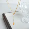 Collar de perlas de diseño de nicho de personalidad simple de alto grado de nuevo estilo francés, colgante de acero de titanio, cadena para la clavícula, joyería versátil