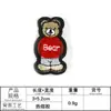 Bordado de computadora logo animal pequeño de dibujos animados oso zapatos y sombreros bolsa accesorios accesorios de ropa parche insignia tela bordada pegatinas
