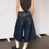 Shorts de mezclilla cropped con patchwork de estrella de cinco puntas estilo callejero americano para hombres y mujeres, pantalones rectos de pierna ancha de longitud media retro de alta costura adelgazantes