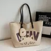 Bolsa Tote de Lona Grande Capacidade para Mulheres, Novo Estilo Verão 2026, Bolsa de Ombro Casual Versátil, Bolsa Tote de Lona para Estudantes Universitários