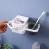 Estante dental de baño sin perforaciones plegable creativo montado en la pared ventosa vaso para enjuague bucal fábrica directa soporte de pared con ventosa