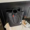 Bolsa de mano a cuadros minimalista estilo japonés y coreano, nuevo diseño de moda 2026, bolso de hombro moderno, gran capacidad, adecuado para estudiantes y sesiones de tutoría