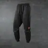 Calça esportiva casual masculina de fleece de cor sólida, tamanho europeu, multipeças, com cordão, calça longa esportiva quente casual adequada para
