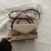 Bolsa de mão quadrada pequena estilo coreano de alta qualidade transfronteiriça, nova bolsa de ombro da moda, elegante e simples, bolsa transversal versátil