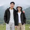 Nueva chaqueta casual unisex, versátil para hombres y mujeres, adecuada para parejas, chaqueta transpirable para exteriores, resistente al agua, con capucha desmontable y personalizable con impresión de logo