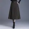 Saia xadrez de lã moderna e estilosa para mulheres, nova saia de cintura alta em A para outono e inverno 2026, saia elegante e versátil com barra larga