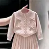 Conjunto de dos piezas de punto dulce color rosa con lazo para niñas, nuevo para otoño 2026, estilo coreano