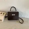 Bolsas de Nicho de Gama Alta para Mujer 2025 Nuevo Bolso de Mano de Invierno Bolso Pequeño Cuadrado de Moda Simple Versátil Bolso de Hombro Cruzado