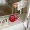 Mini bolso de mano acrílico transfronterizo 2026, nuevo estilo de moda en colores caramelo, bolso de hombro versátil con cadena para mujer
