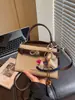 Bolso de Mano Pequeño de Bloques de Color a la Moda para Mujer 2026 Nuevo Estilo Bolso de Hombro Elegante con Textura Bolso Cruzado de Moda