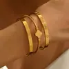 Conjunto de Pulseiras Trevo de Quatro Folhas com Zircônia Versátil Elegante Luxuoso Francês Simples e Moderno para Meninas Pulseira de Aço Titânio de Alta Qualidade