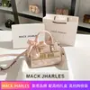 Bolsa de mano bordada de alta gama con textura de moda 2024 gran capacidad Joker bandolera portátil venta al por mayor