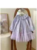 Vestido para Meninas 2026 Primavera Novo Estilo Saia de Malha Floral Roxa Gola Boneca Mangas Bufantes Vestido Princesa para Bebês e Crianças