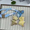 Shuibei Oro Oro Puro 999 Llavero para Teléfono Móvil Bolso Colgante de Moda Patineta Oso Regalo Exquisito para Novia