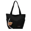 A Bolsa Sacola Casual e Simples Popular Deste Ano para Sala de Aula de Estudantes é uma Bolsa de Ombro Leve da Moda de Grande Capacidade Estilo Executivo para Mulheres