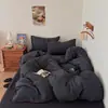 Ins Juego de cuatro piezas a rayas estilo MUJI simple gasa abullonada algodón puro tres piezas lujo ligero retro Maillard dormitorio juego de 3 piezas