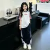 Conjunto de Ropa de Verano para Niñas 2026 Nuevo Estilo Coreano Conjunto Súper Elegante para Niñas Mayores Celebridad de Internet Deportivo Conjunto de Dos Piezas
