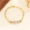 Pulsera de moda niche de diseño único de estilo ins europeo y americano con motivos de mariposa de circón y flor de hielo