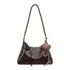 Bolso tipo cartera de empanada modelo 2026 transfronterizo para mujer, de alta gama, para ir al trabajo, gran capacidad, de hombro, bandolera, bolso de mano, bolso casual versátil para mujer