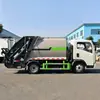 Camión de basura sanitario Dongfeng Tuyi de 10 metros cúbicos Camión de recolección de basura de 20 metros cúbicos Garantía de calidad