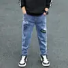 Calças jeans para meninos 2025 primavera e outono novas fabricantes de roupas infantis atacado pequenos e médios meninos estudantes calças infantis
