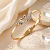 Pulsera bestseller transfronteriza de acero de titanio para mujer, de dos piezas, totalmente incrustada con diamantes, con diseño de cisne blanco y hada, joyería de mano exquisitamente elaborada