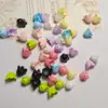Cuentas de acrílico con acabado lechoso de flor de lirio del valle con agujero recto al por mayor, materiales y accesorios para cadenas de teléfono y llaveros DIY