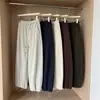 Calça cargo patchwork retrô versátil de cintura alta estilo coreano para mulheres, calça jogger casual de corte solto, nova tendência outono 2026 estilo estudante