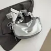 Bolsa plisada de gran capacidad Shuai Mi para mujer, modelo nuevo y moderno 2026, bolsa de un solo hombro cruzada de color sólido para el trabajo, bolsa de empanadilla
